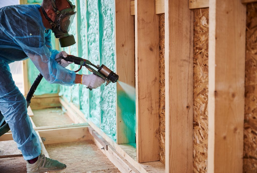 Expert from CT Insulation Services installing spray form insulation